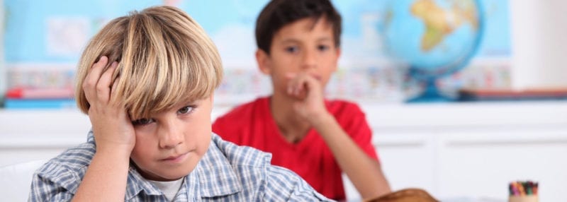 two little boys in classroom; changing schools