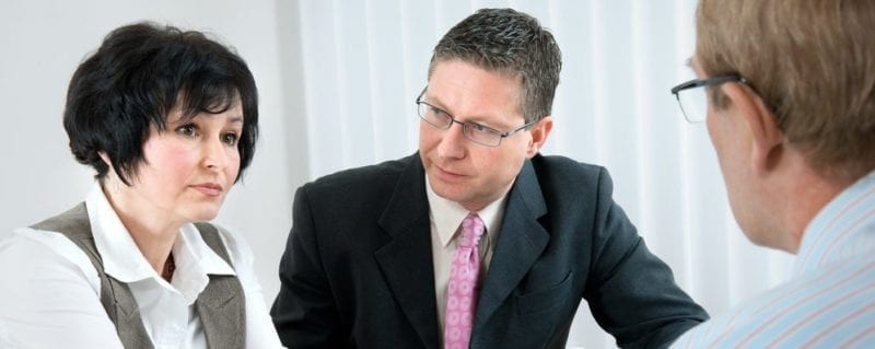 Couple meeting with mediator in Divorce Mediation