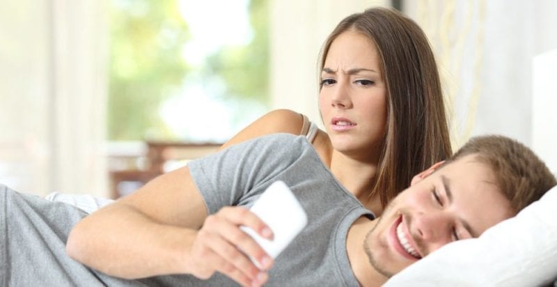 man w/ cell phone committing adultery divorce
