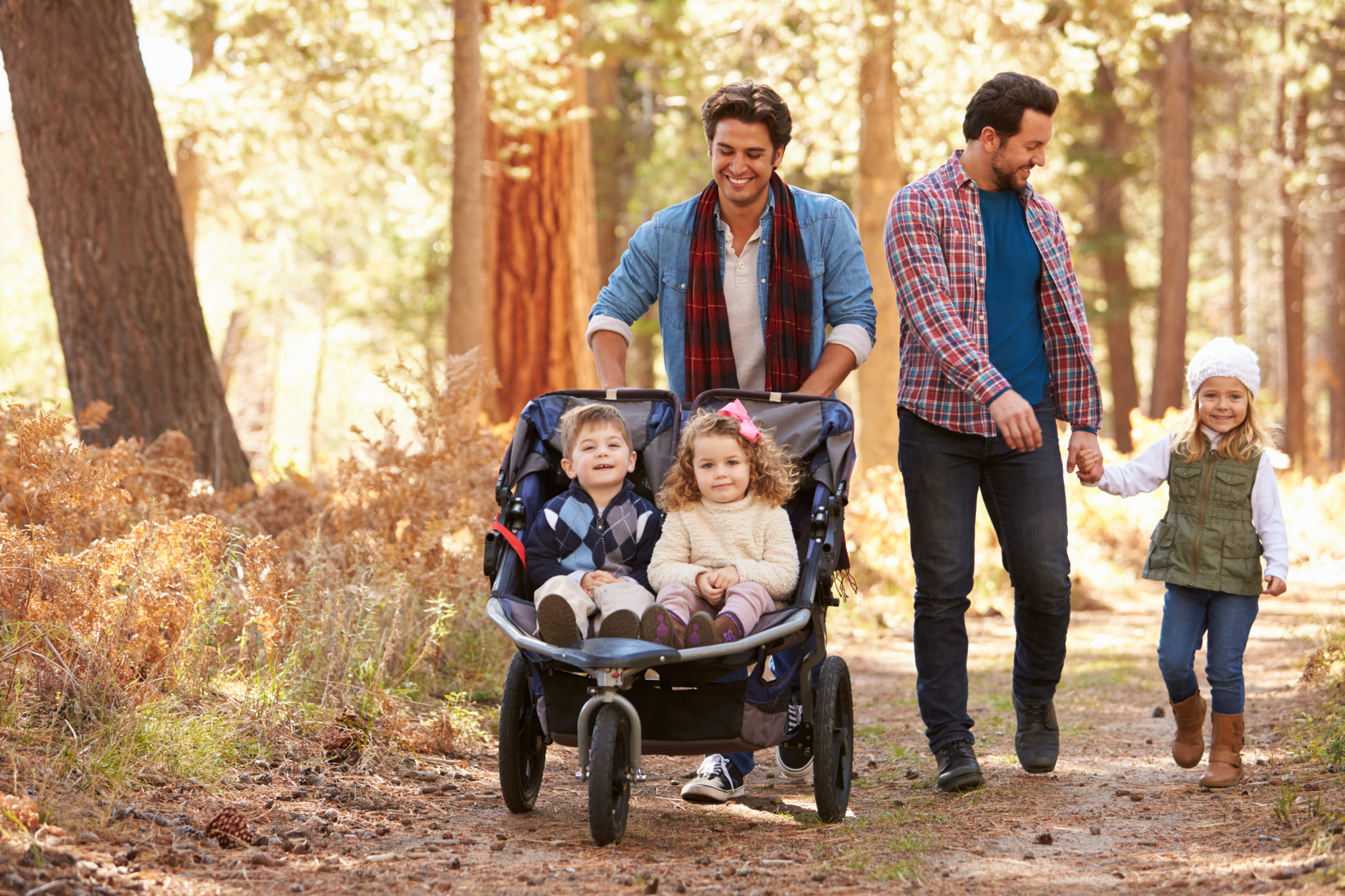 Nesting Custody Arrangements - Gay dads walking with children